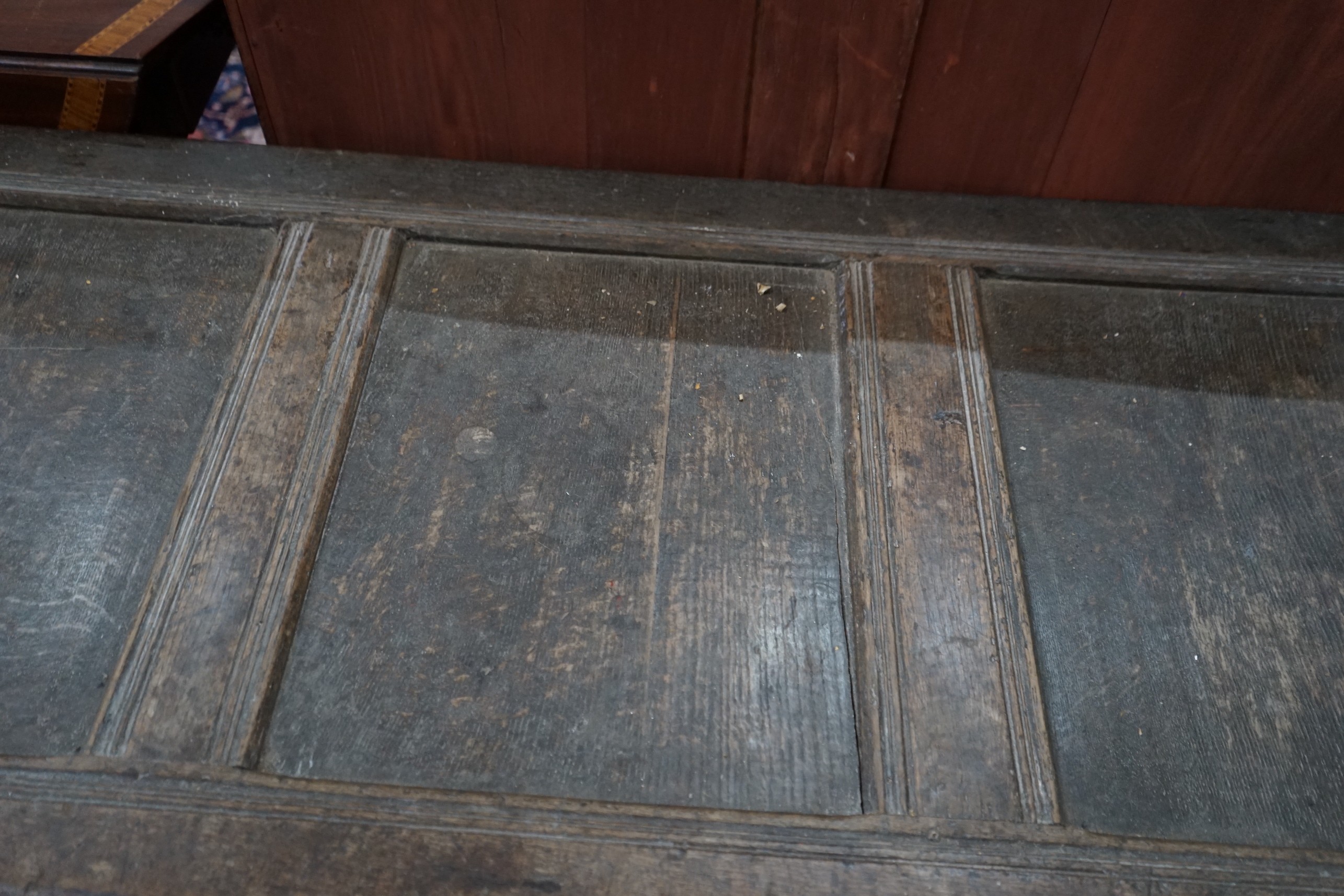 An 18th century carved oak coffer, length 134cm, depth 60cm, height 69cm
